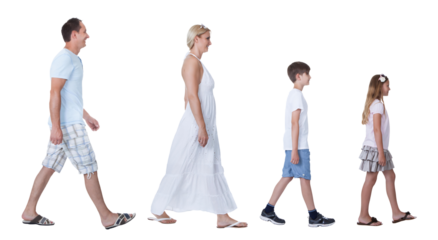 Happy family of four, with parents and two children, walking