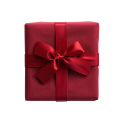 A red gift box tied with a satin ribbon, perfect for holidays or special occasions.