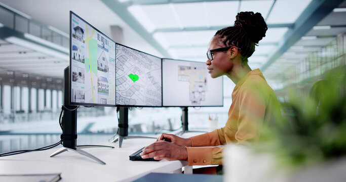 Developer Looking At Land Plot Map And Cadastre Plan