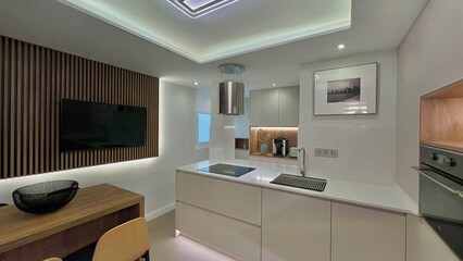 cocina de diseño con isla . zona de lavado y desayunado . almacenaje y electrodomesticos...