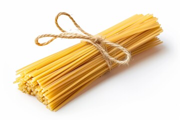 Bundle of uncooked whole grain spaghetti tied with rope, isolated on a white background.