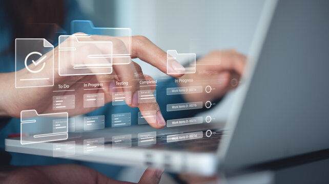 Business developer using Kanban board framework on laptop computer. Agile software development lean project management tool, project management, business development concept