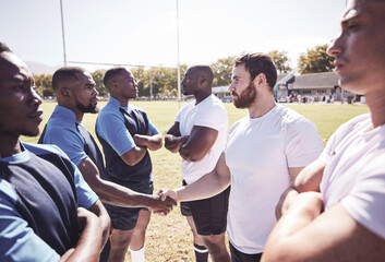 Rugby, men and handshake of team with confidence, sportsmanship or pride in competitive game. Fitness, sports and teamwork, proud players ready for match, workout or tournament on field at club