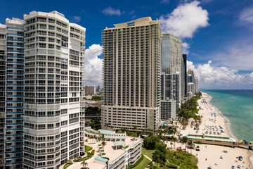 Sunny Isles Beach, Florida - Aerial of luxurious and tall residential condos and waterfront hotels...