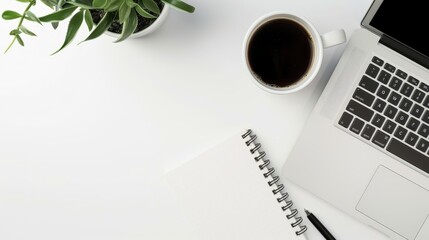Minimalist Workspace with Laptop, Notebook, and Coffee