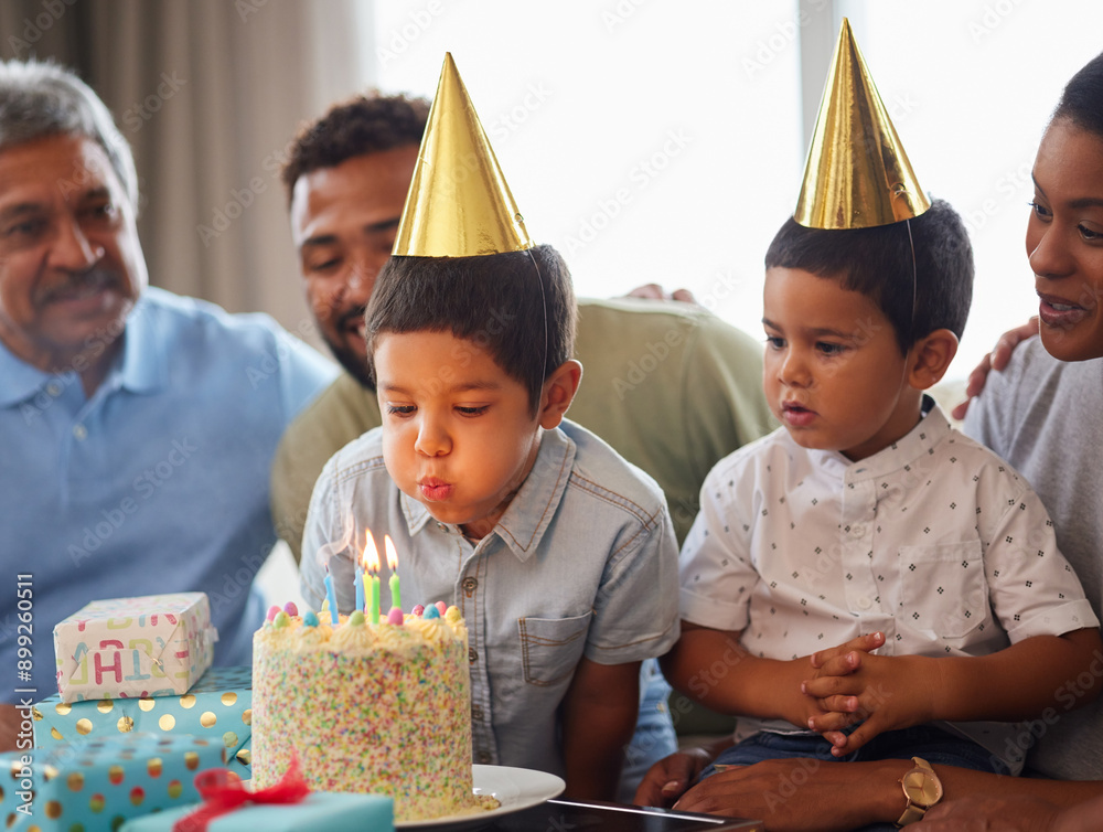 Canvas Prints Family, boy and birthday cake with blowing on sofa for bonding, support and people at fun home event. Grandparents, parents and children for growth, celebration and party with gift in living room