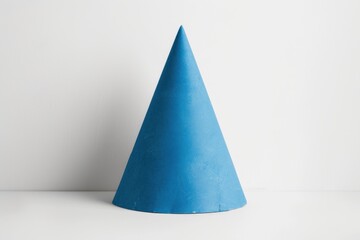 Symmetrical depiction of a blue cone, minimalist design symbolizing harmony