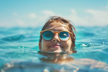 Naklejka premium Girl in the sea enjoying the sun, holiday travel vacation relaxation leisure