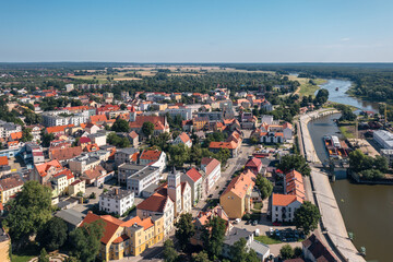 Obraz premium Summer skyline cityscape of Nowa Sól, a city on the Oder River in Lubusz region, Poland. Wide panoramic aerial view