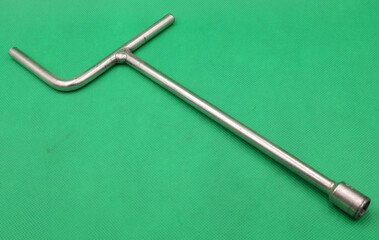 Wrench on a green table
