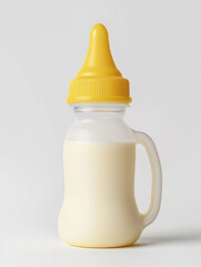 Feeding bottle with infant formula and pacifier. Baby milk bottle isolated