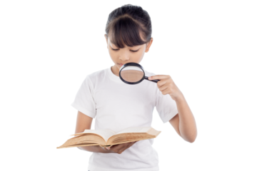 Young Asian girl is reading book using magnifier isolated on white background with clipping path.