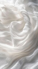  A tight shot of a white cloth with indistinct patterns at its upper and lower edges The lower edge is particularly blurred
