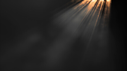 A dramatic black background with a gradient gold spotlight streaming down, creating an elegant and mysterious atmosphere.
