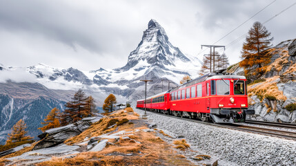 Modern red train traversing through a breathtaking landscape with majestic mountains in the background epitomizing travel in a serene alpine setting Wallpaper Background Poster