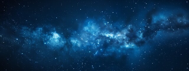Fototapeta premium countless stars, dark blue and white intermingled, above a blue sky studded with stars