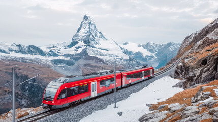 Modern red train traversing through a breathtaking landscape with majestic mountains in the background epitomizing travel in a serene alpine setting Wallpaper Background Poster