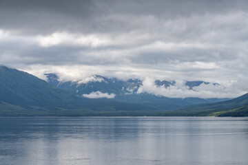 Turnagain Arm, It is one of two narrow branches at the north end of Cook Inlet, the other being Knik Arm. Turnagain is subject to climate extremes and large tide ranges. Kenai Mountains.

