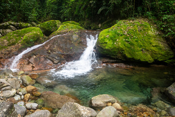 Beautiful view to green waterfall in Atlantic Rainforest mountain
