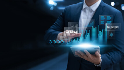 Digital marketing and sales data analysis, businessman analyzing financial reports and sales data,...