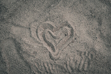 A heart drawn on the beach.