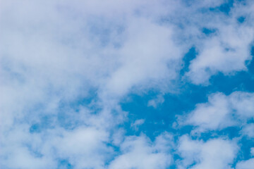 Texture of blue sky with clouds, background