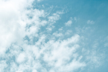 Texture of blue sky with clouds, background