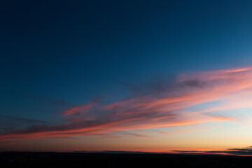 Colourful landscape of beautiful dark sunset or sunrise. Natural abstract background.