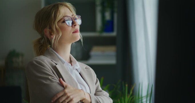 Confident Businesswoman Looks Into Future with Optimism