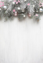 Christmas and New Year background..Fir branch with Christmas decorations old wooden shabby background with empty space for text.