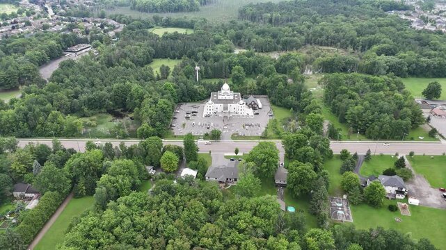 Aerial footage of Gurudwara Singh Sabha Cambridge on a cloudy day in, Ontario, Canada