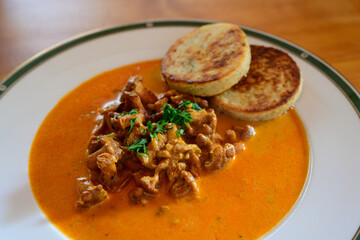 Chanterelle Goulash or Eierschwammerlgulasch with Fried Bread Dumplings