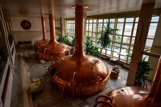 Ceske Budejovice - July 13 2024: Budweiser Budvar Brew House Interior with Copper Wort Pans or Brew Kettles for Beer Production.