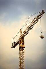 Naklejka premium photo of construction crane, crane construction, building houses