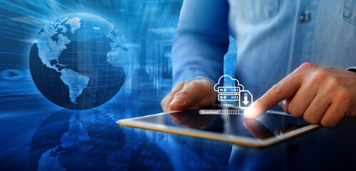 man downloading computer files or installing softwarecloud storage technology, data backup, cyber securit
