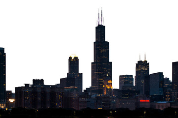 Chicago skyline at night with illuminated skyscrapers and dark sky