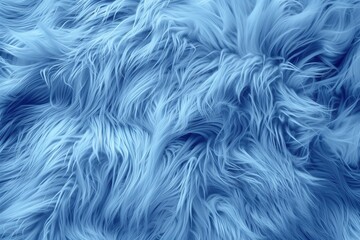 Fototapeta premium Close-up of blue faux fur texture with soft, flowing strands. Backdrop for fashion design, home decor, background with copyspace for vibrant, plush material