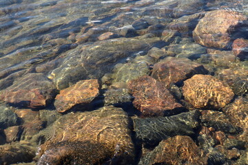 Rock and stones at the Baltic sea. Peaceful summer day. Fogdö, Roslagen, Stockholm, Sweden.