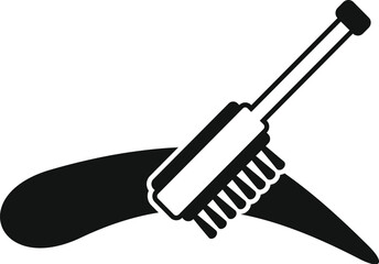 Black brow dye being applied with a brush for a professional makeup and beauty treatment