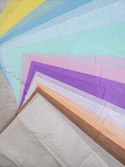 Multi-colored paper Quietly fanned out, top view