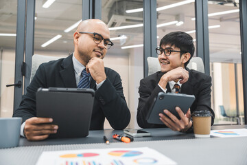 Asian business people team analyzing statistics financial. Group Team of ceo business man and woman Meeting Conference Discussion various topic. Executive professional managers Corporate in office.