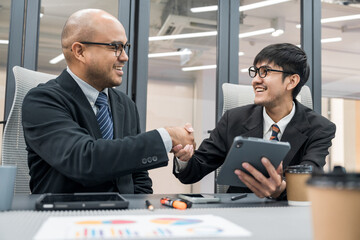 Asian business people team analyzing statistics financial. Group Team of ceo business man and woman Meeting Conference Discussion various topic. Executive professional managers Corporate in office.