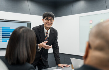 Asian business people team analyzing statistics financial. Group Team of ceo business man and woman Meeting Conference Discussion various topic. Executive professional managers Corporate in office.