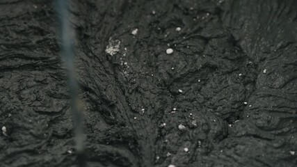 Slow motion mixing hardener in micro concrete plaster