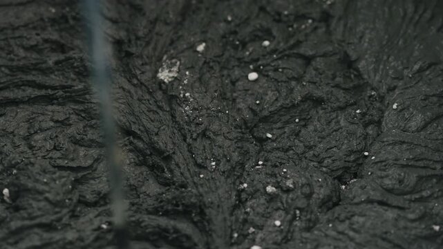 Slow motion mixing hardener in micro concrete plaster