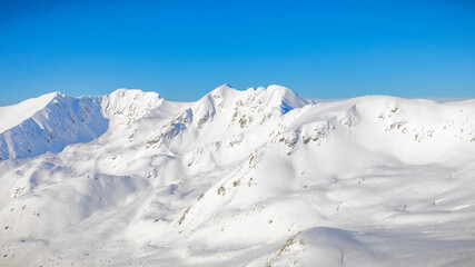 snow covered mountains in winter