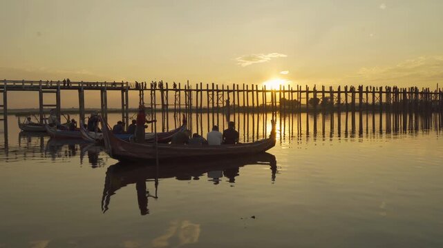 U Bein Bridge with lake, Wooden Bridge in Mon village, Myanmar or Burma, Asia.