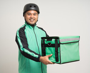 Young asian rider wearing green jacket uniform and bike helmet various action with delivery box. Male delivery service worker. Courier and shipping food service to customer online application