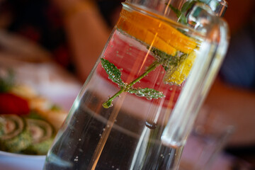 traditional drink in a jug with lemon and mint