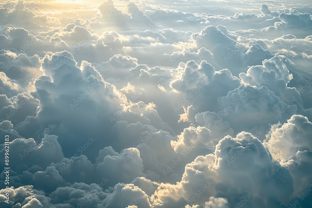 Wall mural Aerial View of Sunlit Clouds - Fluffy Cotton-Like Texture  